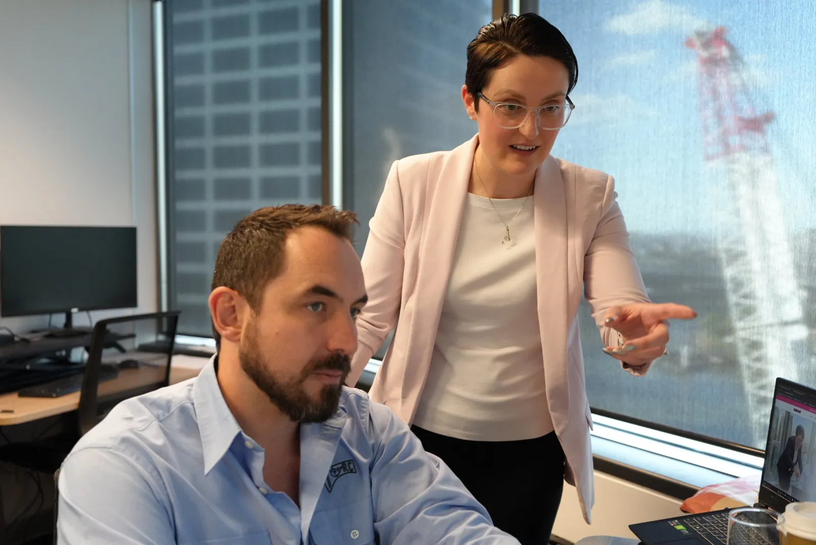 Amanda helping a business owner organise business knowledge